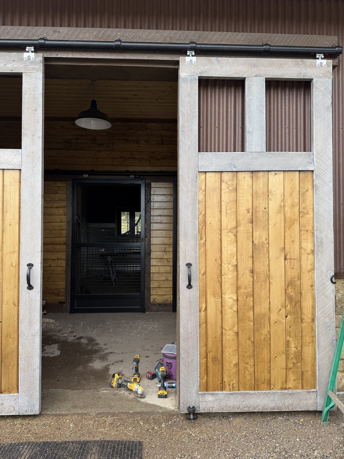 Custom barn doors built and hung in New Castle, by Rock Royalty